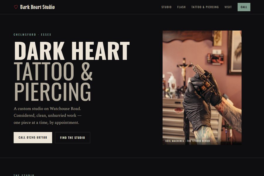 Homepage of the Dark Heart Studio site, showing the studio name in blackletter and a call button.